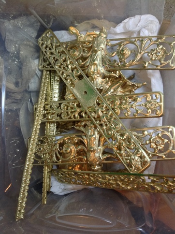 Cleaned brass pieces awaiting attachment